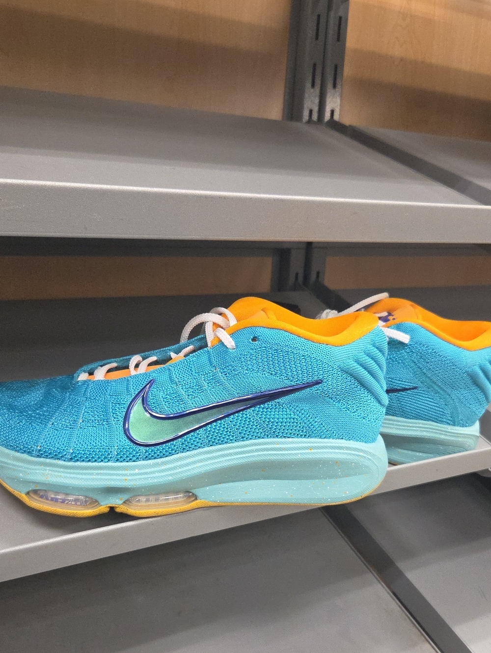 Nike Kids Turquoise with Orange Accent Sneakers